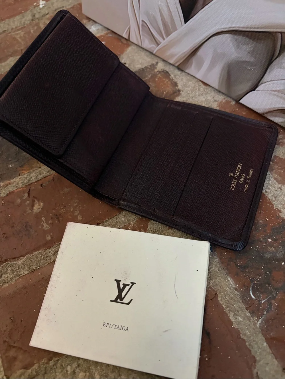 Louis Vuitton Men’s Dark Brown Taiga Leather Bifold Wallet